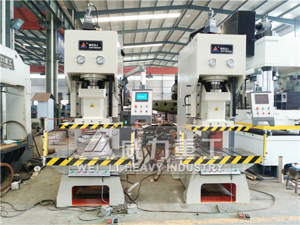 帶有光電保護(hù)裝置的160噸液壓沖床